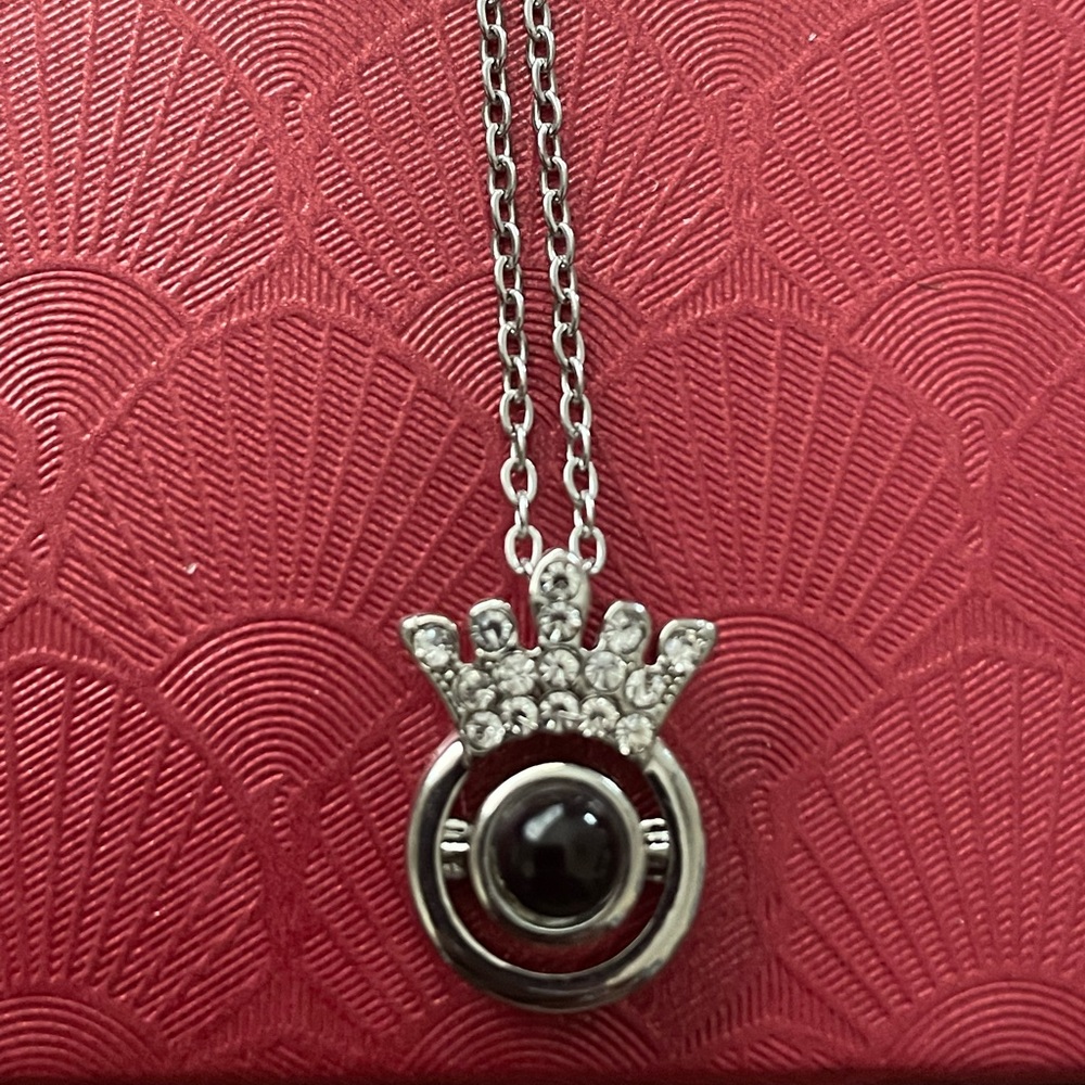 Crown charm necklace.